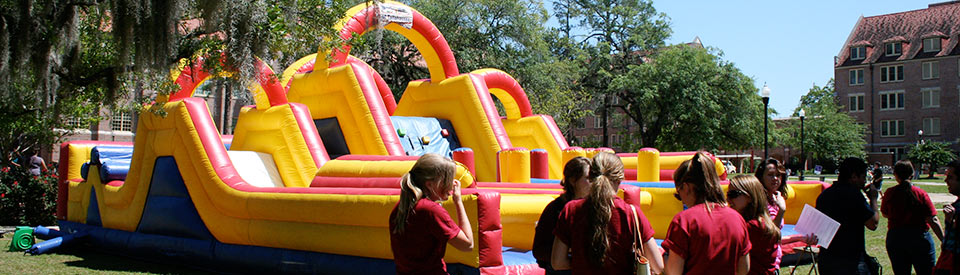 Photo of students participating in a Homecoming event