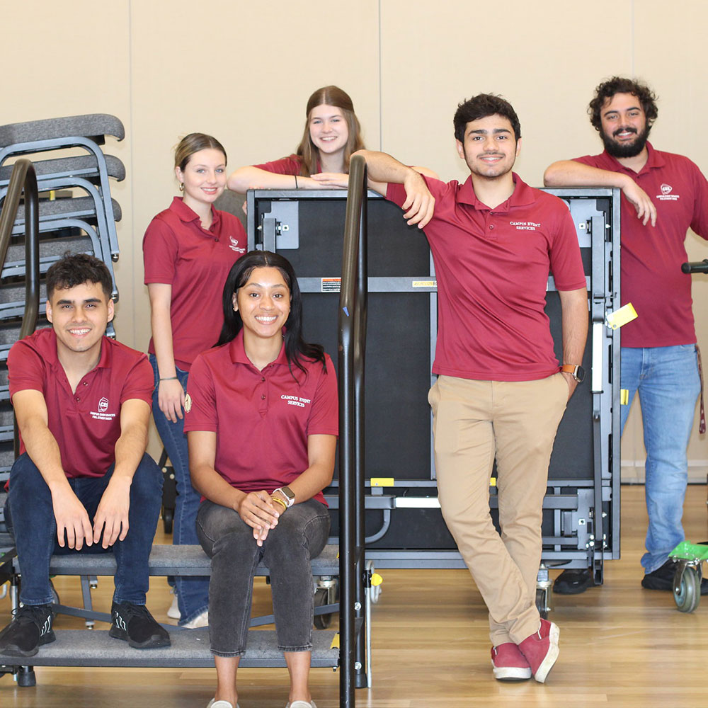 Posed photo of a group of student workers in the Union