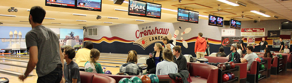 Photo of students bowling