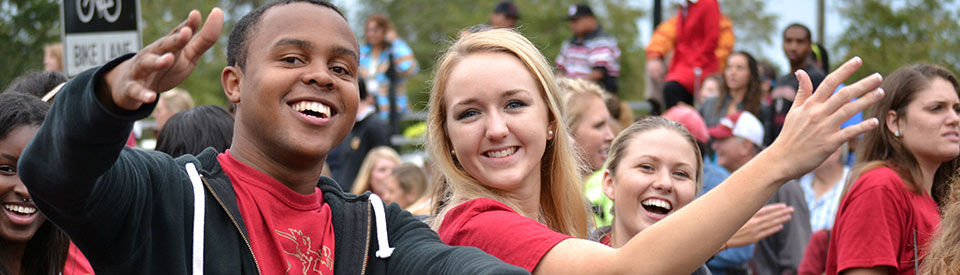 Student participating in the Homecoming parade