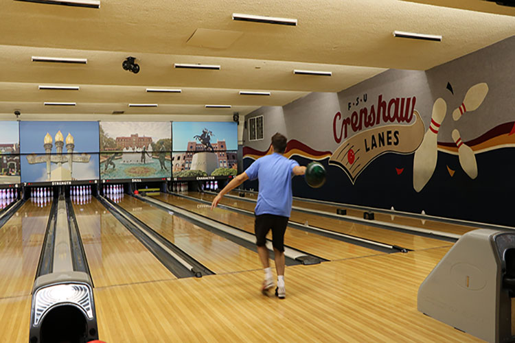 Student bowling at Crenshaw Lanes